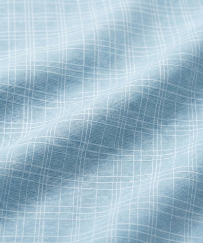 Close-up specialized jacquard polyamide fabric texture on DapperTee Paris blue checks shirt.