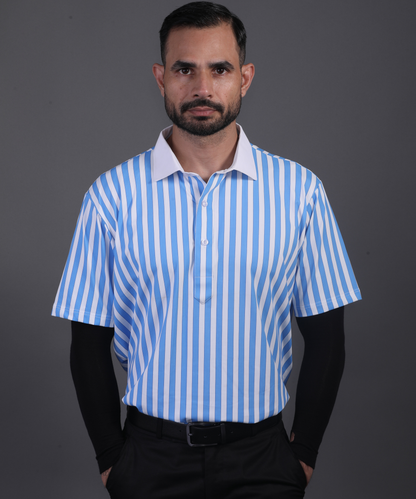 Well groomed model wearing DapperTee Luxe blue stripe polo for premium aesthetic.