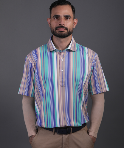 Well groomed model wearing DapperTee Luxe Vertical polo for premium golf aesthetic.