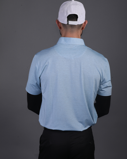 DapperTee blue knit polo styled for high-end professional environments and corporate leadership.
