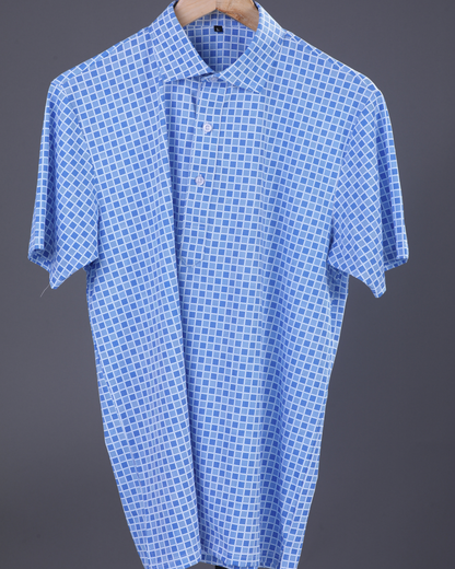 DapperTee blue jacquard polo highlighting professional open collar and premium tailored fit.