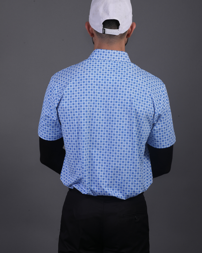 DapperTee blue jacquard polo styled for high-end professional environments and corporate leadership.