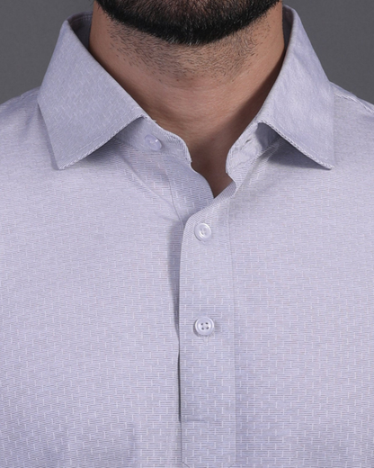DapperTee grey jacquard polo highlighting firm collar and professional high-end tailored fit.