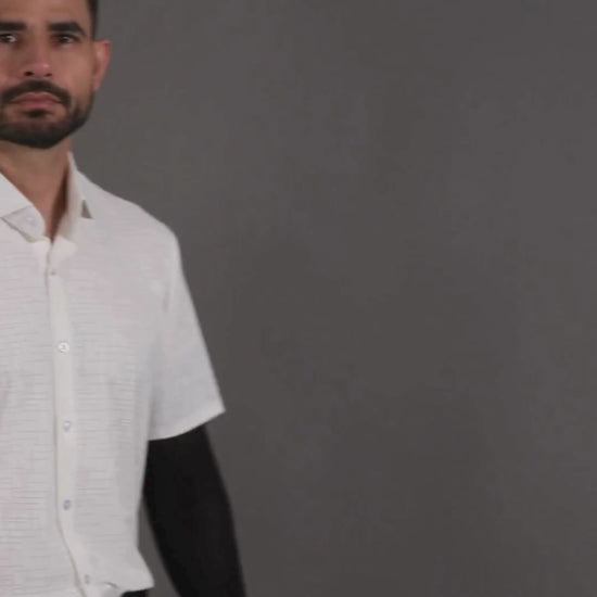 Performance video showcasing DapperTee stretchable open polo during a professional corporate meeting.
