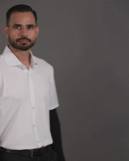 Performance video showcasing DapperTee stretchable open polo during a professional corporate meeting.