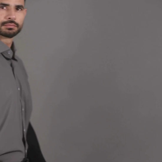 Performance video showcasing DapperTee stretchable open polo during a professional corporate meeting.