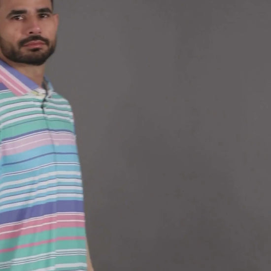 Performance video showcasing DapperTee stretchable golf polo fabric during professional movement.