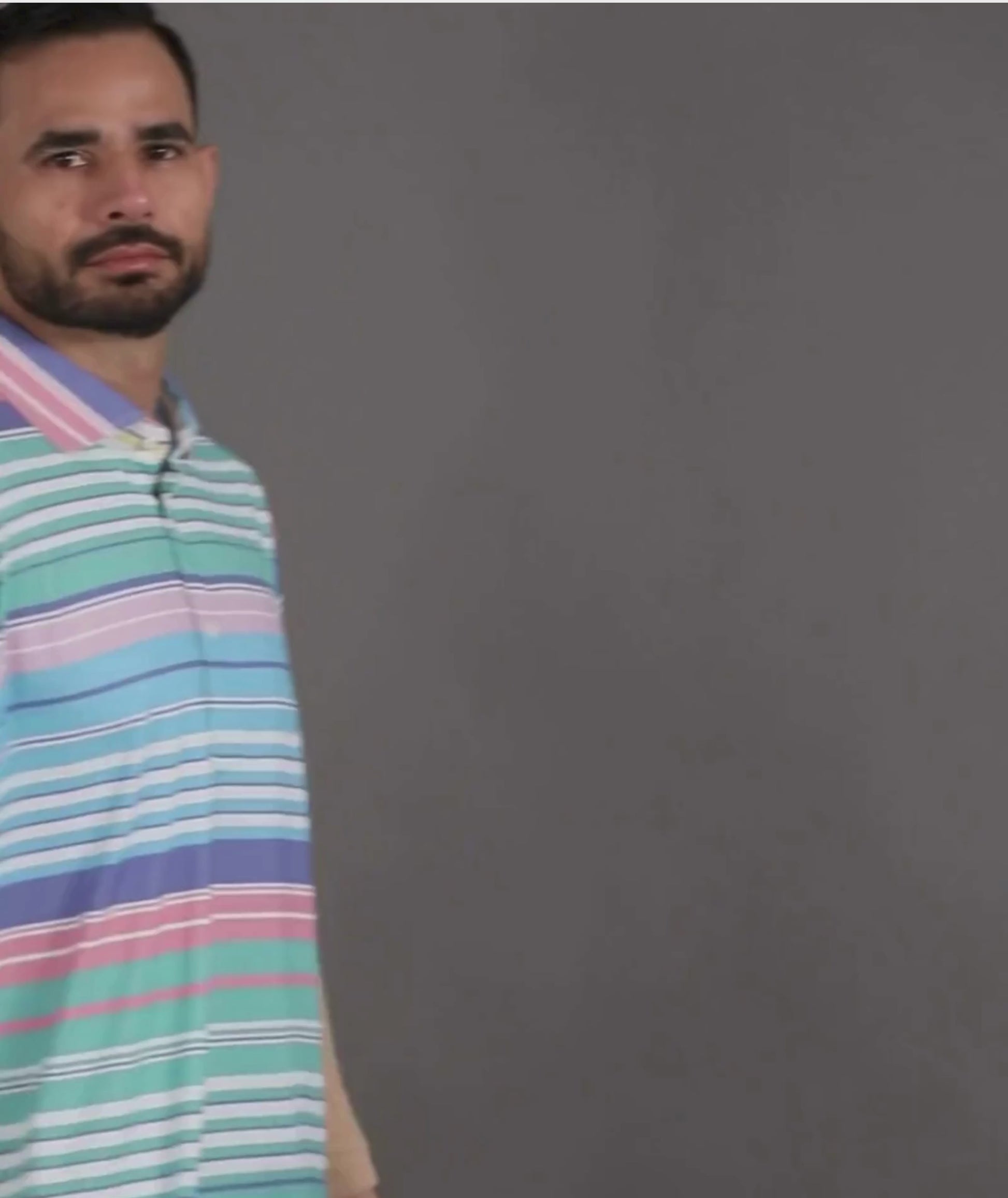 Performance video showcasing DapperTee stretchable golf polo fabric during professional movement.