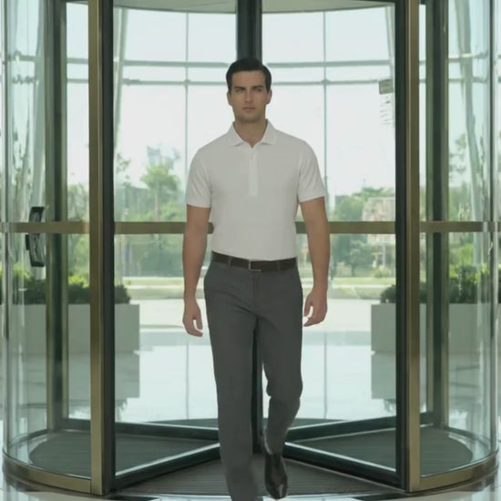 Performance video showcasing DapperTee stretchable white polo during a professional office walk.