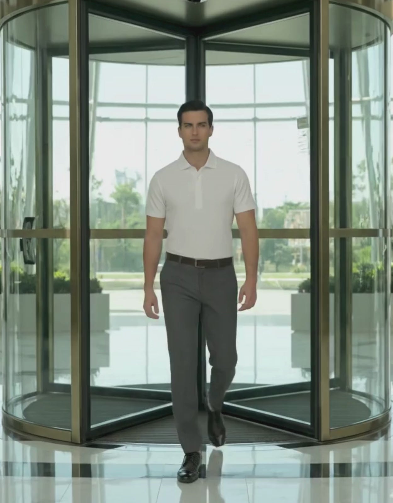 Performance video showcasing DapperTee stretchable white polo during a professional office walk.