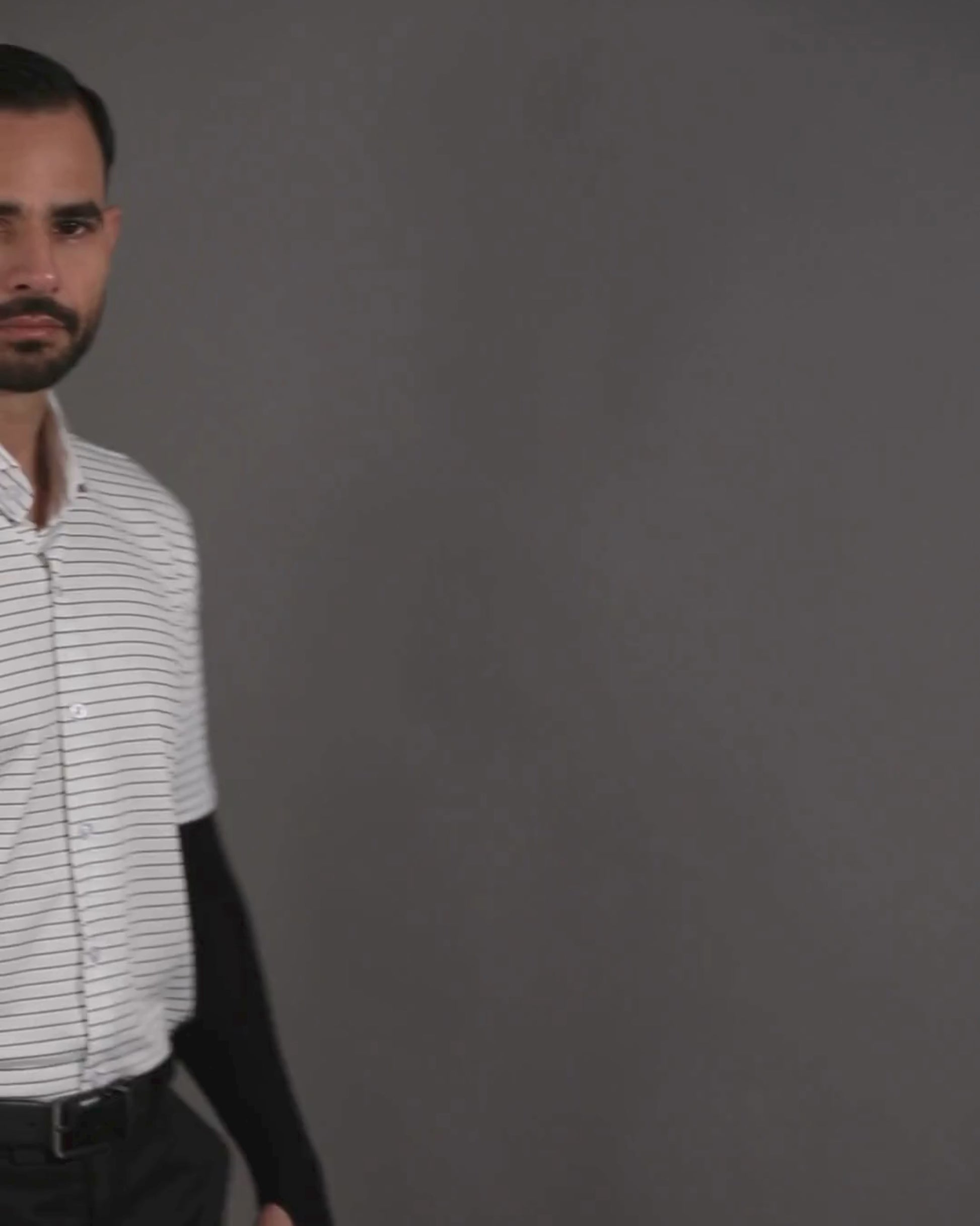 Performance video showcasing DapperTee stretchable open polo shirt during a professional presentation.