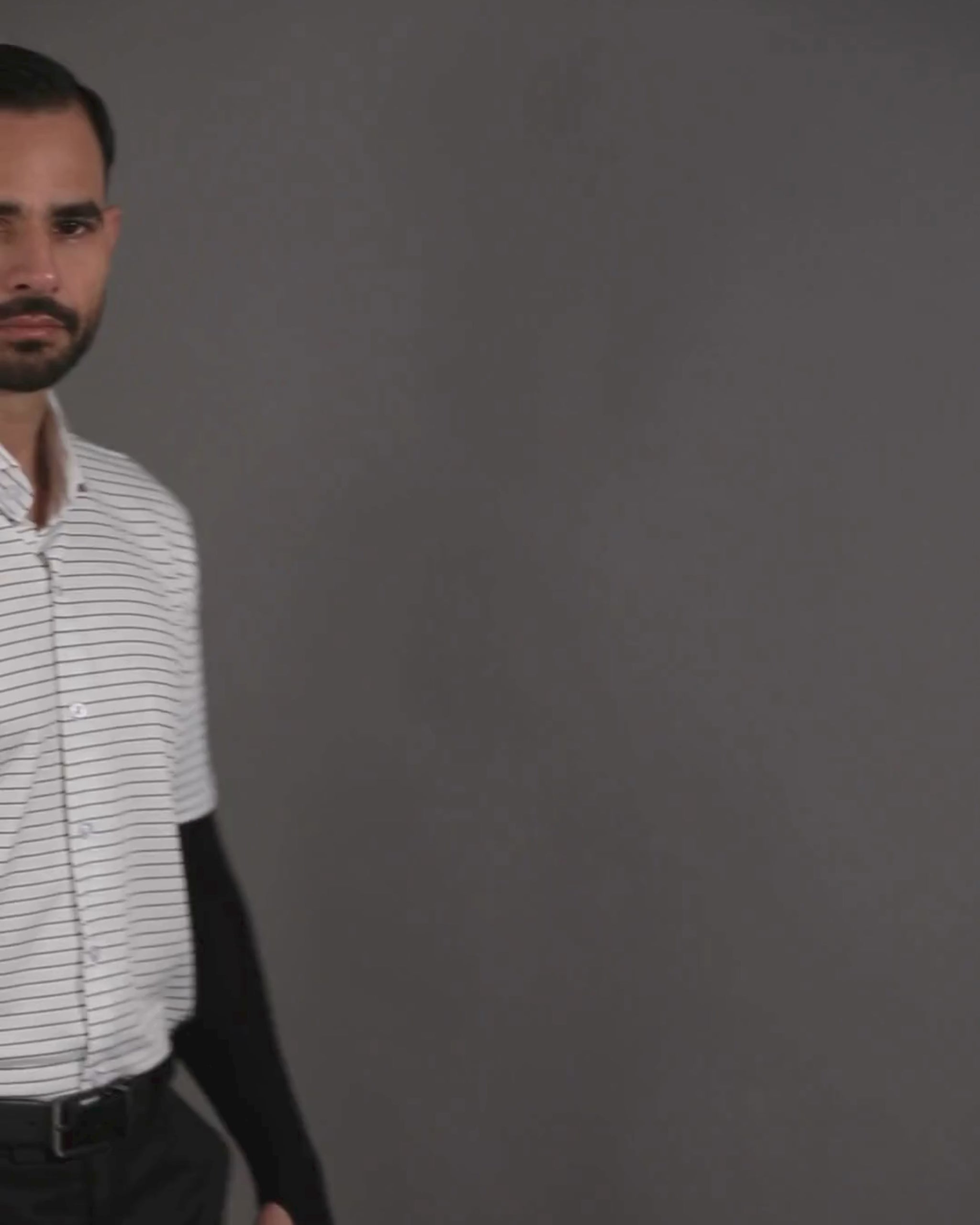 Performance video showcasing DapperTee stretchable open polo shirt during a professional presentation.