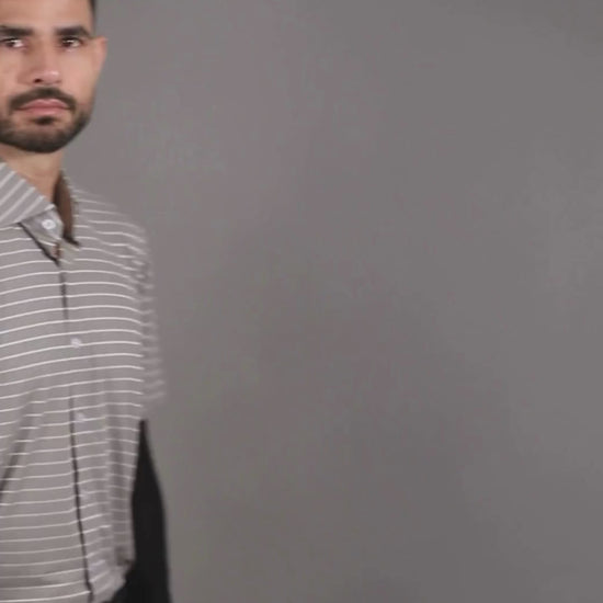 Performance video showcasing DapperTee stretchable open polo during a professional corporate meeting.