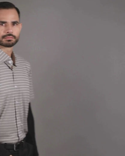 Performance video showcasing DapperTee stretchable open polo during a professional corporate meeting.