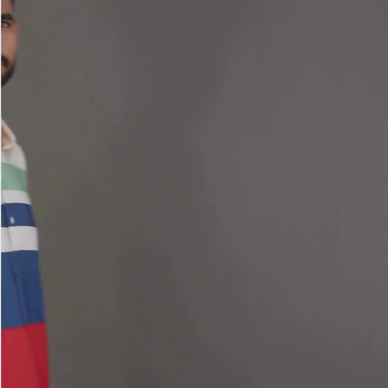 Performance video showcasing DapperTee stretchable golf polo fabric during professional athletic movement.