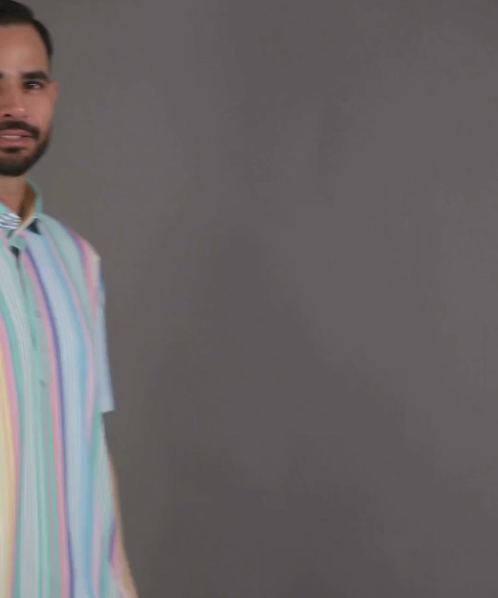 DapperTee Vertical Luxe Stripes polo featuring crisp collar and signature V-placket design.