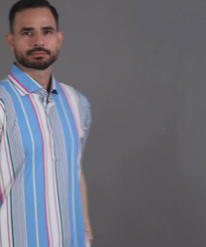 DapperTee blue vertical stripe luxury office polo with signature V-placket design.